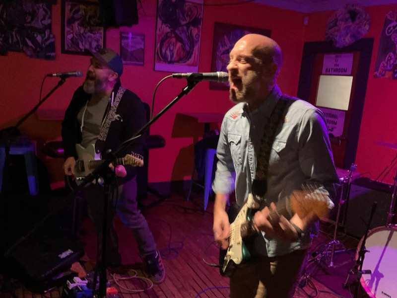 The Royal Me playing a live show, Todd and Ford onstage